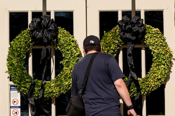 A man enters the Jimmy Carter National Historical Park, Monday, Dec. 30, 2024, in Plains, Ga. Former President Carter died Sunday at the age of 100. (AP Photo/Mike Stewart)