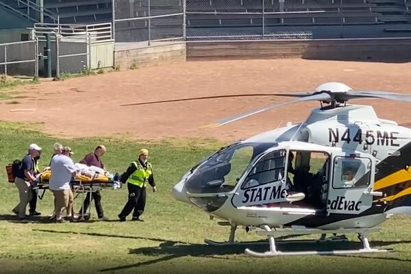 FILE - In this still image from video, author Salman Rushdie is taken on a stretcher to a helicopter for transport to a hospital after he was attacked during a lecture at the Chautauqua Institution in Chautauqua, N.Y., Friday, Aug. 12, 2022. (AP Photo, File)