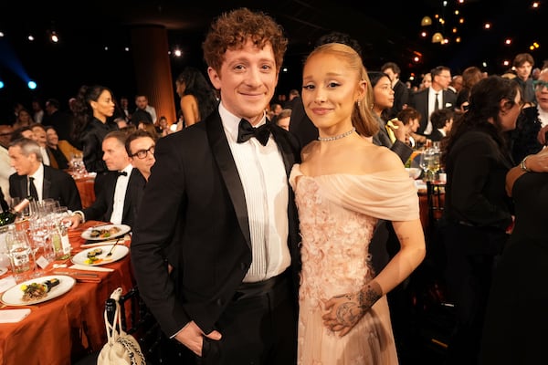 Ethan Slater, left, and Ariana Grande in the audience during the 31st annual Screen Actors Guild Awards on Sunday, Feb. 23, 2025, at the Shrine Auditorium in Los Angeles. (AP Photo/Chris Pizzello)