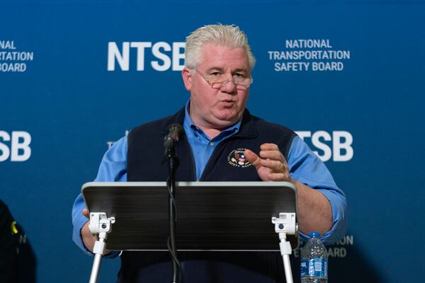 National Transportation Safety Board member Todd Inman speaks with reporters at Ronald Reagan Washington National Airport, Saturday, Feb. 1, 2025, in Arlington, Va. (AP Photo/Jose Luis Magana)