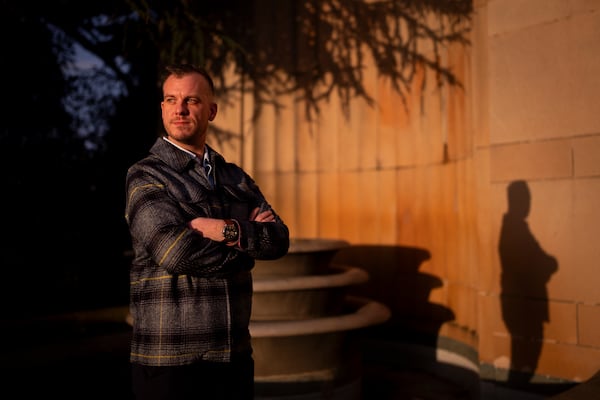 Recreational rugby player Sean McDowell, whose SafeSport case investigator Jason Krasley was fired after being arrested for stealing drug money in his previous job as a police officer, poses for a portrait Wednesday, Dec. 18, 2024, in Seattle. (AP Photo/Lindsey Wasson)