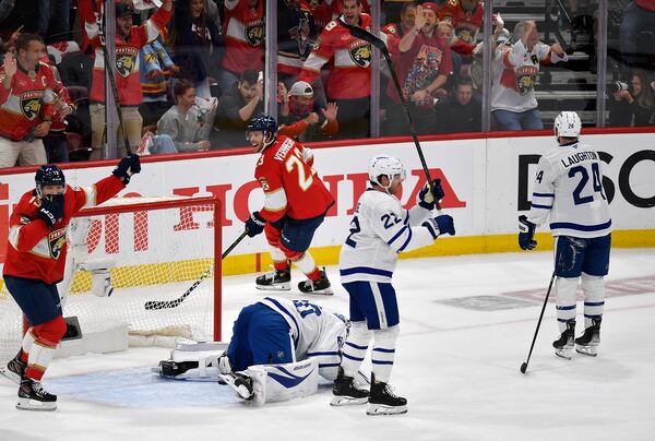 Florida Panthers center Carter Verhaeghe (23) celebrates after scoring during the first period of Game 4 of a second-round NHL hockey playoff series against the Toronto Maple Leafs, Sunday, May 11, 2025, in Sunrise, Fla. (AP Photo/Michael Laughlin)