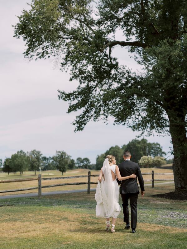 Matthew and Rachel Borriello on their wedding day in Egg Harbor, N.J. on July 31, 2022. (Asher Gardner Photography via AP)