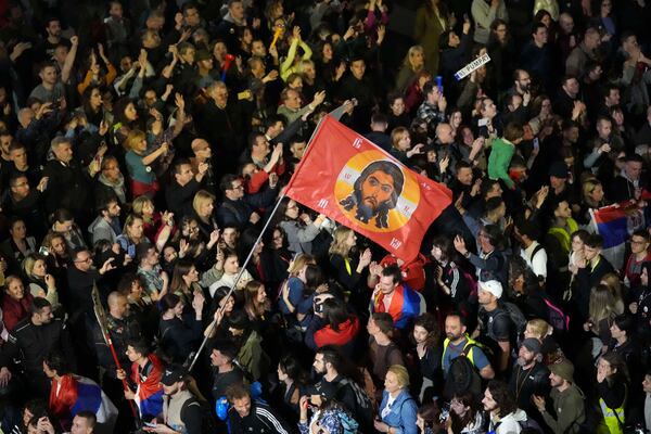 Protesters gather ahead of a major rally this weekend in downtown Belgrade, Serbia, Friday, March 14, 2025. (AP Photo/Darko Vojinovic)