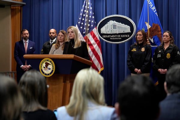 Attorney General Pam Bondi speaks at a news conference regarding immigration enforcement at the Justice Department, Wednesday, Feb. 12, 2025, in Washington. (AP Photo/Ben Curtis)