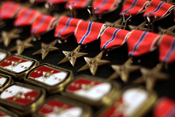 FILE - Bronze Star Medals are seen before being presented during a ceremony to Japanese American World War II veterans of the 100th Infantry Battalion, 442nd Regimental Combat Team at the Washington Hilton in Washington, Nov. 1, 2011. (AP Photo/Carolyn Kaster, file)