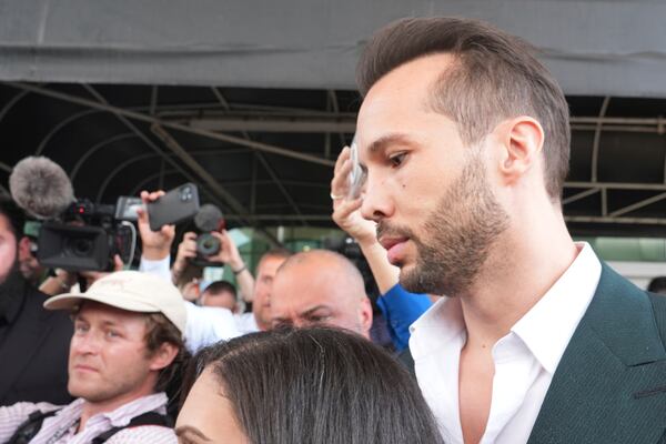 Tristan Tate arrives, Thursday, Feb. 27, 2025, in Fort Lauderdale, Fla. Tristan and his brother Andrew were charged with human trafficking in Romania and arrived in the U.S. after authorities lifted travel restrictions. (AP Photo/Marta Lavandier)