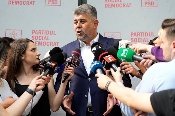 Romanian Prime Minister Marcel Ciolacu speaks to media at the PSD headquarters, in Bucharest, Romania, Monday, May 5, 2025, the day after the governing coalition's candidate failed to advance to the runoff in the presidential election rerun. (AP Photo/Andreea Alexandru)