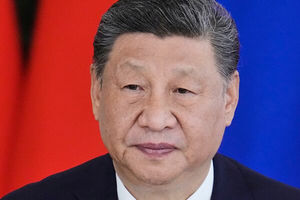 Chinese President Xi Jinpin attends a signing ceremony with Russian President Vladimir Putin after their meeting at the Kremlin in Moscow, Russia, Thursday, May 8, 2025, ahead of celebrations of the 80th anniversary of the Soviet Union's victory over Nazi Germany during the World War II. (AP Photo/Pavel Bednyakov)