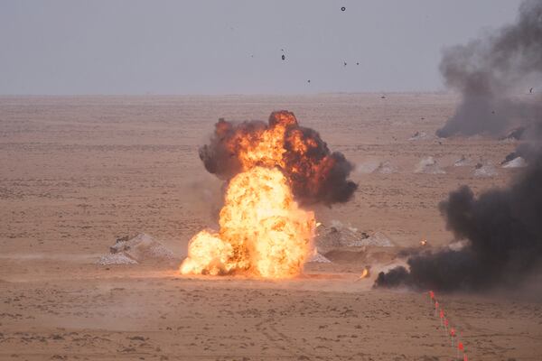 A target is hit with artillery fire as U.S and Moroccan military forces take part in the 21st edition of the African Lion military exercise, in Tantan, south of Agadir, Morocco, Friday, May 23, 2025. (AP Photo/Mosa'ab Elshamy)