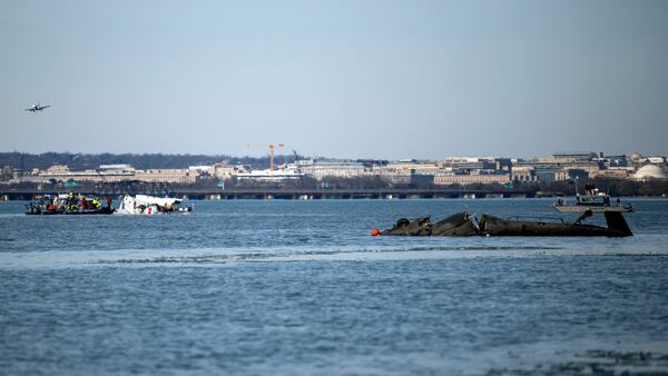 In this image provided by the U.S. Coast Guard, wreckage is seen in the Potomac River near Ronald Reagan Washington National Airport, Thursday, Jan. 30, 2025 in Washington. (Petty Officer 2nd Class Taylor Bacon, U.S. Coast Guard via AP)