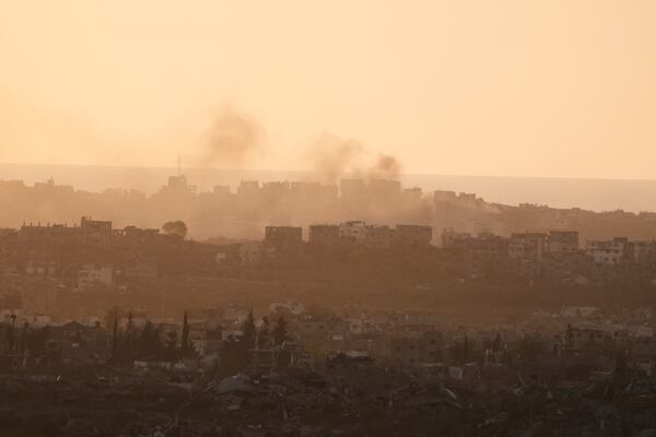 Smoke rises following an Israeli army bombardment in Gaza Strip, seen from southern Israel, Tuesday, May 20, 2025. (AP Photo/Maya Alleruzzo)