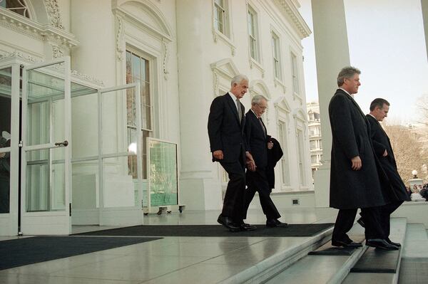 FILE - Outgoing President George Bush, far right, accompanied by President-elect Bill Clinton, depart the White House for Capitol Hill to attend the swearing in ceremony of Clinton as the nation's 42nd president, in Washington, Jan 20, 1993. (AP Photo/Doug Mills, File)