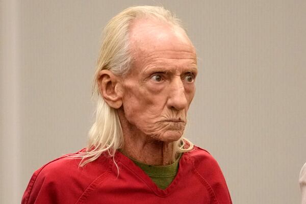 FILE - Joseph Czuba, 71, stands before Circuit Judge Dave Carlson for his arraignment at the Will County, Ill., courthouse, Oct. 30, 2023, in Joliet, Ill. (AP Photo/Charles Rex Arbogast, File)