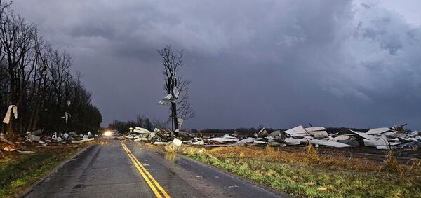 Debris covers the road during a severe storm passed the area north of Seymour, Mo., in Webster County late Friday, March 14, 2025. (Trooper Austin James/Missouri State Highway Patrol via AP)