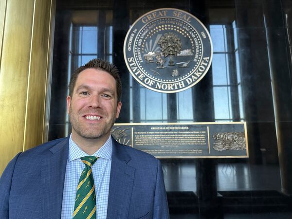 FILE -North Dakota Republican Secretary of State Michael Howe stands in Memorial Hall of the state Capitol in Bismarck, N.D., on Sept. 29, 2023. (AP Photo/Jack Dura, File)