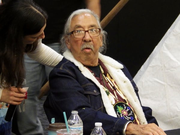 Leonard Peltier, center, a Native American activist released from a Florida prison where he had been serving a life sentence in the 1975 killings of two FBI agents, pauses as he greets well-wishers during a welcome event for him, Wednesday, Feb. 19, 2025, at the Sky Dancer Casino Resort near Belcourt, N.D., on the Turtle Mountain Reservation. (AP Photo/Jack Dura)