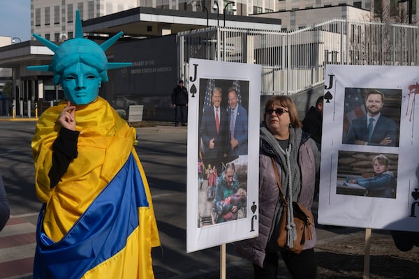 People protest against President Donald Trump's policy concerning Ukraine in front of the US Embassy in Kyiv, Ukraine, Saturday, March 8, 2025. (AP Photo/Efrem Lukatsky)