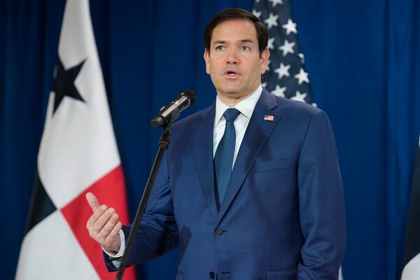 Secretary of State Marco Rubio speaks to reporters after watching people board a repatriation flight bound for Colombia at Albrook Airport in Panama City, Monday, Feb. 3, 2025. (AP Photo/Mark Schiefelbein, Pool)