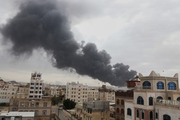 Smoke billows following Israeli airstrikes targeting a power plant and Sanaa Airport, in Sanaa, Yemen, Tuesday, May 6, 2025. (AP Photo/Osamah Abdulrahman)
