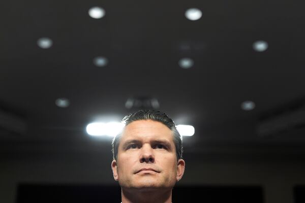 Pete Hegseth, President-elect Donald Trump's choice to be Defense secretary, appears before the Senate Armed Services Committee for his confirmation hearing, at the Capitol in Washington, Tuesday, Jan. 14, 2025. (AP Photo/Alex Brandon)