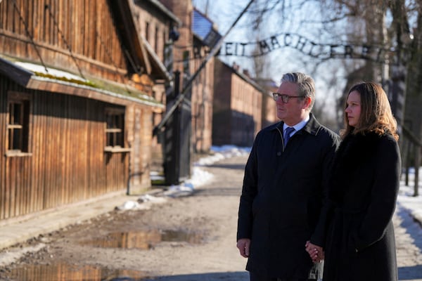 Britain's Prime Minister Keir Starmer and his wife Victoria Starmer visit the Memorial And Museum Auschwitz-Birkenau, a former Nazi German concentration and extermination camp, in Oswiecim, Poland, Friday Jan. 17, 2025. (Aleksandra Szmigiel/Pool via AP)