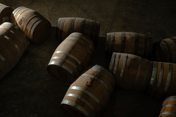 Bourbon barrels with product in them are seen inside of the Brough Brothers Distillery in Louisville, Ky., Saturday, March 8, 2025. (AP Photo/Jon Cherry)