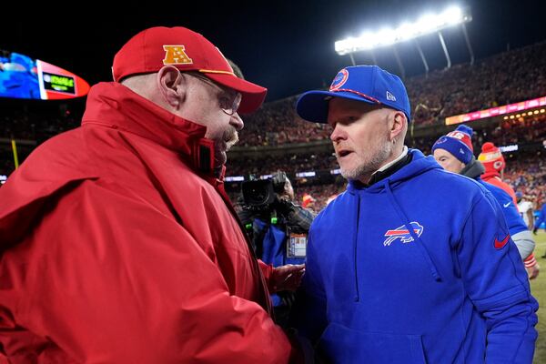 Kansas City Chiefs head coach Andy Reid speaks with Buffalo Bills head coach Sean McDermott after the AFC Championship NFL football game, Sunday, Jan. 26, 2025, in Kansas City, Mo. (AP Photo/Ashley Landis)