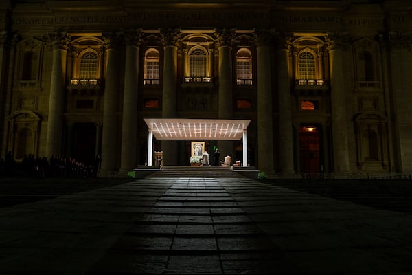 Cardinal Giovanni Batista Re leads a nightly rosary prayer service for the health of Pope Francis in St. Peter's Square at the Vatican, Wednesday, Feb. 26, 2025. (AP Photo/Bernat Armangue)