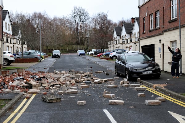 Parts of a wall of a house have fallen down caused by the winds of storm Eowyn that hit the country in Belfast, Northern Ireland, Friday, Jan. 24, 2025.(AP Photo)