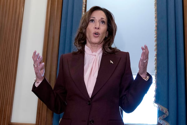 Vice President Kamala Harris talks to reporters after presiding over a joint session of congress to confirm the Electoral College votes at the Capitol, Monday, Jan. 6, 2025, in Washington. (AP Photo/Jose Luis Magana)