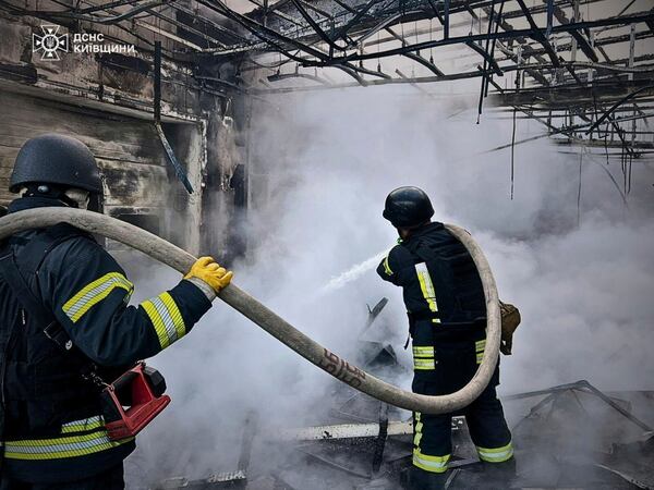 In this photo provided by the Ukrainian Emergency Service, firefighters put out the fire following Russia's drone attack in the Kyiv region, Ukraine, Sunday, May 18, 2025. (Ukrainian Emergency Service via AP)