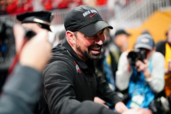 Ohio State head coach Ryan Day celebrates after their win against Notre Dame in the College Football Playoff national championship game Monday, Jan. 20, 2025, in Atlanta. (AP Photo/Jacob Kupferman)