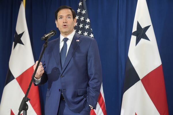 Secretary of State Marco Rubio speaks to reporters after watching people board a repatriation flight bound for Colombia at Albrook Airport in Panama City, Monday, Feb. 3, 2025. (AP Photo/Mark Schiefelbein, Pool)