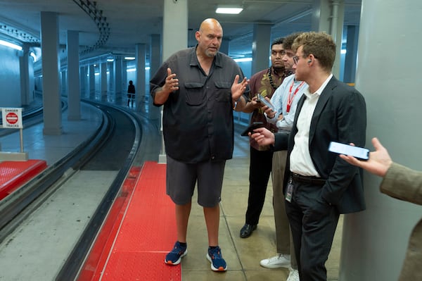 FILE - Sen. John Fetterman, D-Pa., speaks with reporters on Capitol Hill in Washington, July 9, 2024. (AP Photo/Cliff Owen, File)