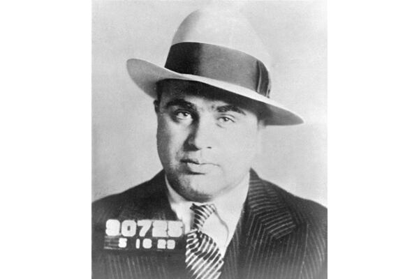 FILE - Chicago gangster Al Capone has his photo taken while in custody in Philadelphia, May 18, 1929, on charges of carrying concealed weapons. (AP Photo, File)