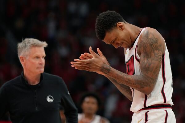 Houston Rockets' Jabari Smith Jr. reacts during the second half of Game 7 of an NBA basketball first-round playoff series against the Golden State Warriors Sunday, May 4, 2025, in Houston. (AP Photo/Ashley Landis)