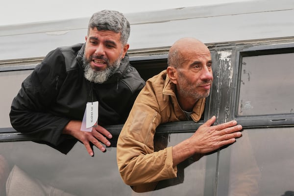 Freed Palestinian prisoners arrive in the Gaza Strip after being released from an Israeli prison following a ceasefire agreement between Hamas and Israel in Khan Younis, souther Gaza Strip, Saturday Feb. 8, 2025. (AP Photo/Abdel Kareem Hana)