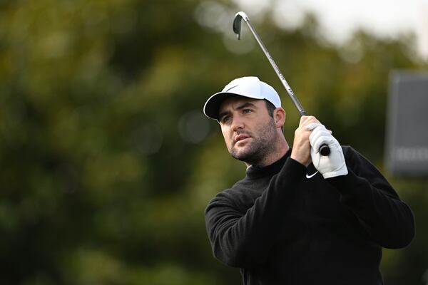 Scottie Scheffler hits from the first tee at Pebble Beach Golf Links during the final round of the AT&T Pebble Beach Pro-Am golf tournament, Sunday, Feb. 2, 2025, in Pebble Beach, Calif. (AP Photo/Nic Coury)