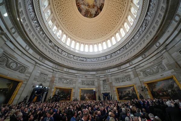 People attend the 60th Presidential Inauguration in the Rotunda of the U.S. Capitol in Washington, Monday, Jan. 20, 2025. (AP Photo/Julia Demaree Nikhinson, Pool)