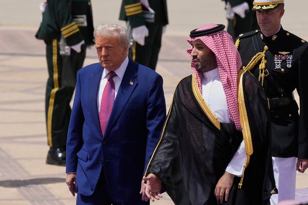 President Donald Trump speaks with Saudi Crown Prince Mohammed bin Salman during an arrival ceremony at the Royal Terminal of King Khalid International Airport in Riyadh, Saudi Arabia, Tuesday, May 13, 2025. (AP Photo/Alex Brandon)
