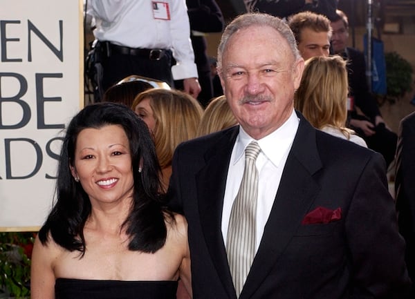 FILE - Actor Gene Hackman arrives with his wife, Betsy Arakawa, for the 60th Annual Golden Globe Awards in Beverly Hills, Calif., Sunday, Jan. 19, 2003. (AP Photo/Mark J. Terrill, File)