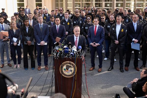 U.S. Attorney John Durham, center front, speaks at a news conference outside the federal courthouse in the Brooklyn borough of New York, Friday, Feb. 28, 2025, following the arraignment of Cartel leaders Rafael Caro Quintero and Vicente Carrillo Fuentes. (AP Photo/Seth Wenig)