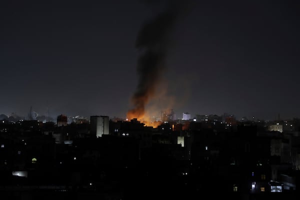 Smoke rises from a location reportedly struck by U.S. airstrikes in Sanaa, Yemen, Wednesday, March 19, 2025. (AP Photo/Osamah Abdulrahman)