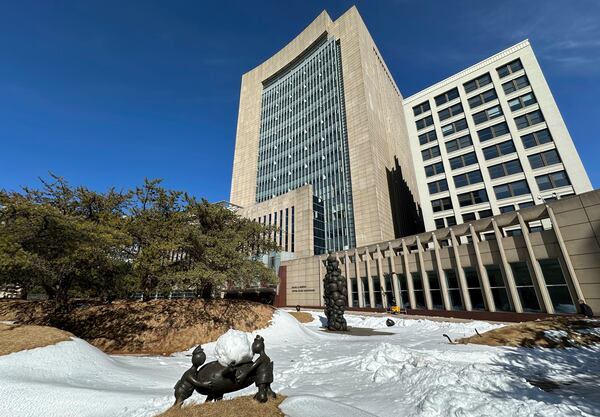 The plaza outside the Diana E. Murphy United States Courthouse in Minneapolis is shown covered in snow on Friday, March 7, 2025. (AP Photo/Steve Karnowski)