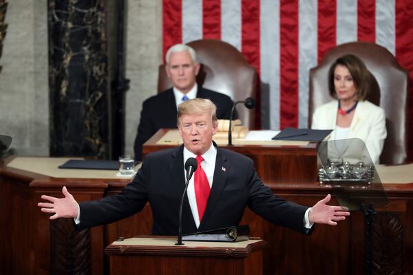 FILE - President Donald Trump delivers his State of the Union address to a joint session of Congress on Capitol Hill in Washington, as Vice President Mike Pence and Speaker of the House Nancy Pelosi, D-Calif., watch, Feb. 5, 2019. (AP Photo/Andrew Harnik, File)