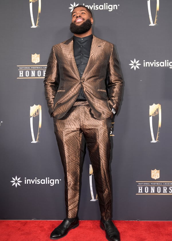 Jared Verse, of the Los Angels Rams, poses on the red carpet at the NFL Honors award show ahead of the Super Bowl 59 football game, Thursday, Feb. 6, 2025, in New Orleans. (AP Photo/Gerald Herbert)