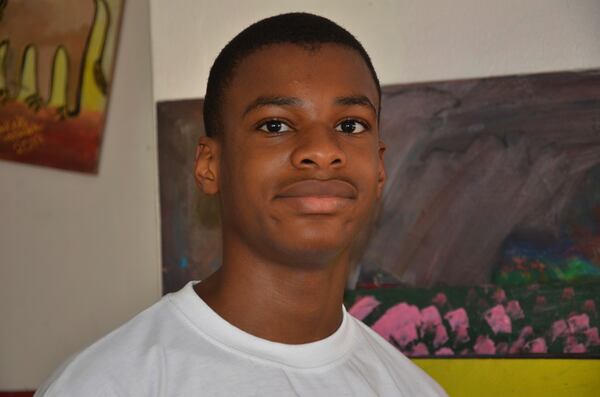 Kanyeyachukwu Tagbo Okeke, a 15 year-old autistic Nigerian, who set a Guinness World Record for the world's largest art canvas, is photograph during an interview in Abuja, Nigeria, Friday, April 18, 2025. (AP Photo/Olamikan Gbemiga)