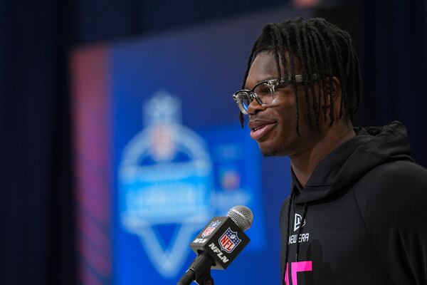 Colorado defensive back Travis Hunter speaks during a press conference at the NFL football scouting combine in Indianapolis, Thursday, Feb. 27, 2025. (AP Photo/Michael Conroy)