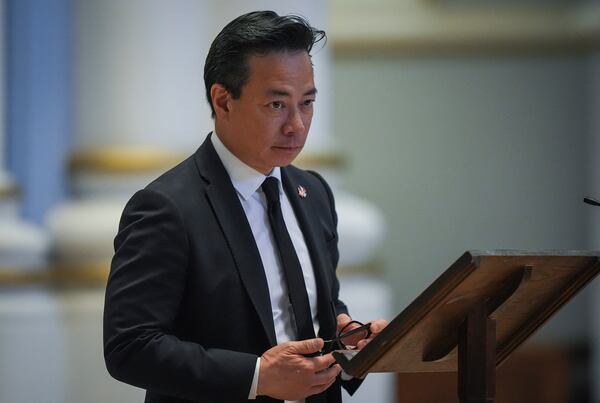 Vancouver Mayor Ken Sim pauses while speaking after mass at Holy Rosary Cathedral on a provincial day of mourning for the victims of the vehicle-ramming attack at the Filipino community's Lapu Lapu Day festival last week, in Vancouver, on Friday, May 2, 2025. (Darryl Dyck/The Canadian Press via AP)